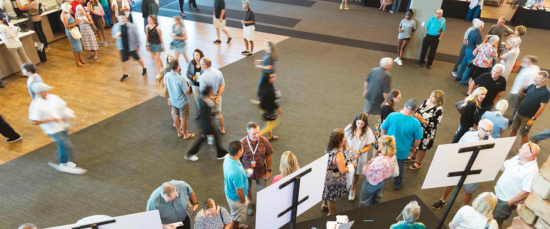 People walking around in the lobby at Mission Hills Church